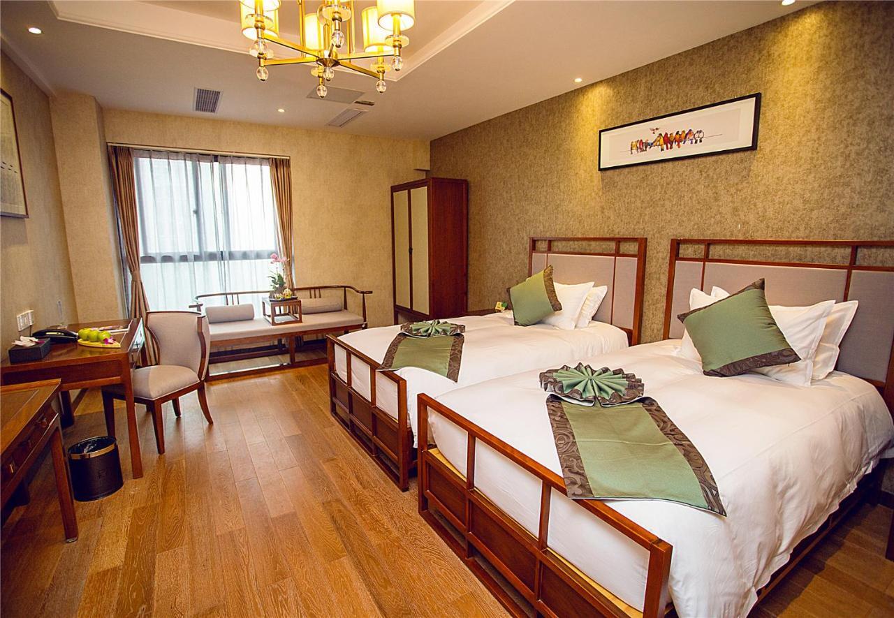 Blossom Tao Hotel（Hangzhou Olympic Center） Номер фото