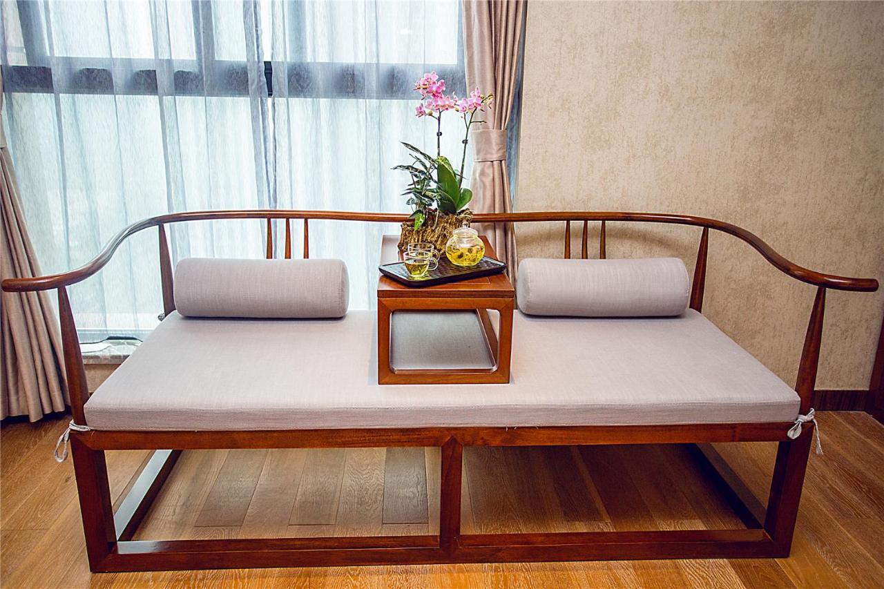 Blossom Tao Hotel（Hangzhou Olympic Center） Номер фото