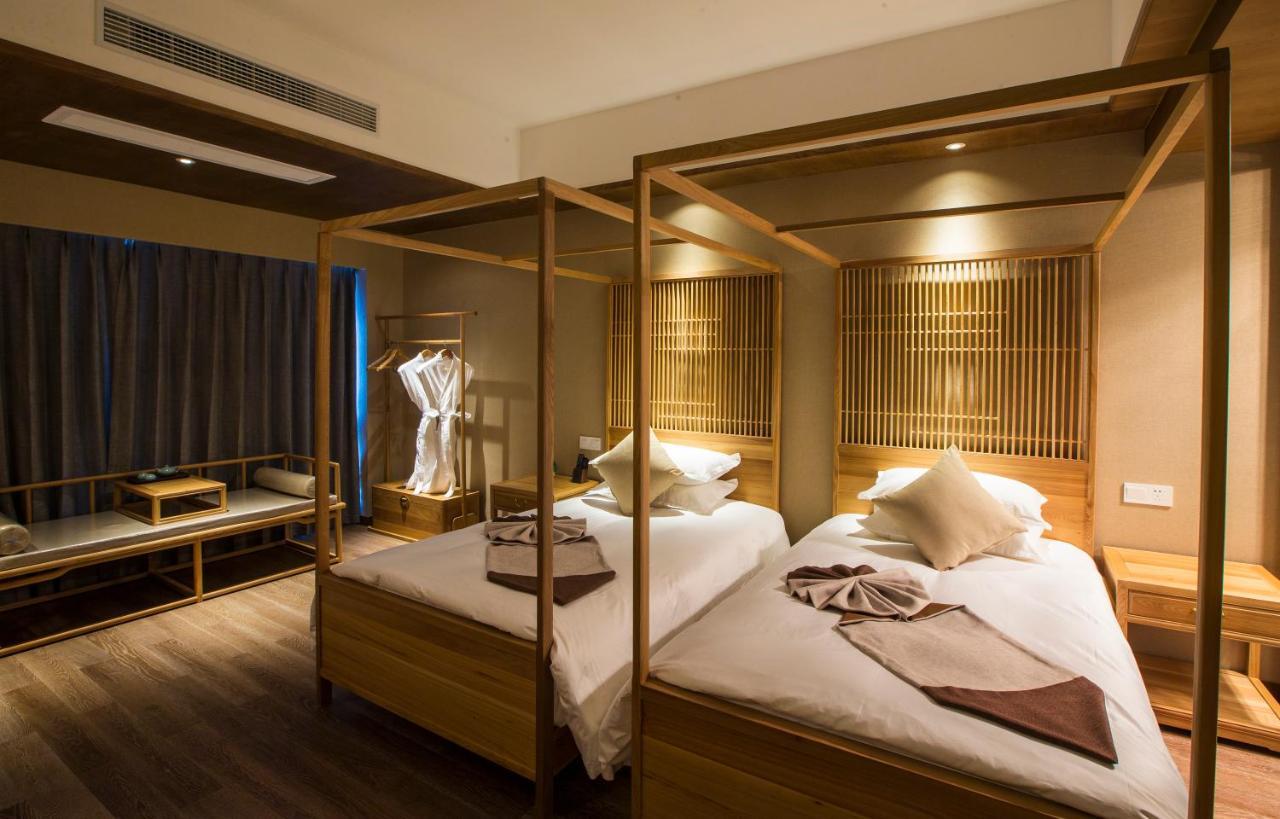 Blossom Tao Hotel（Hangzhou Olympic Center） Номер фото