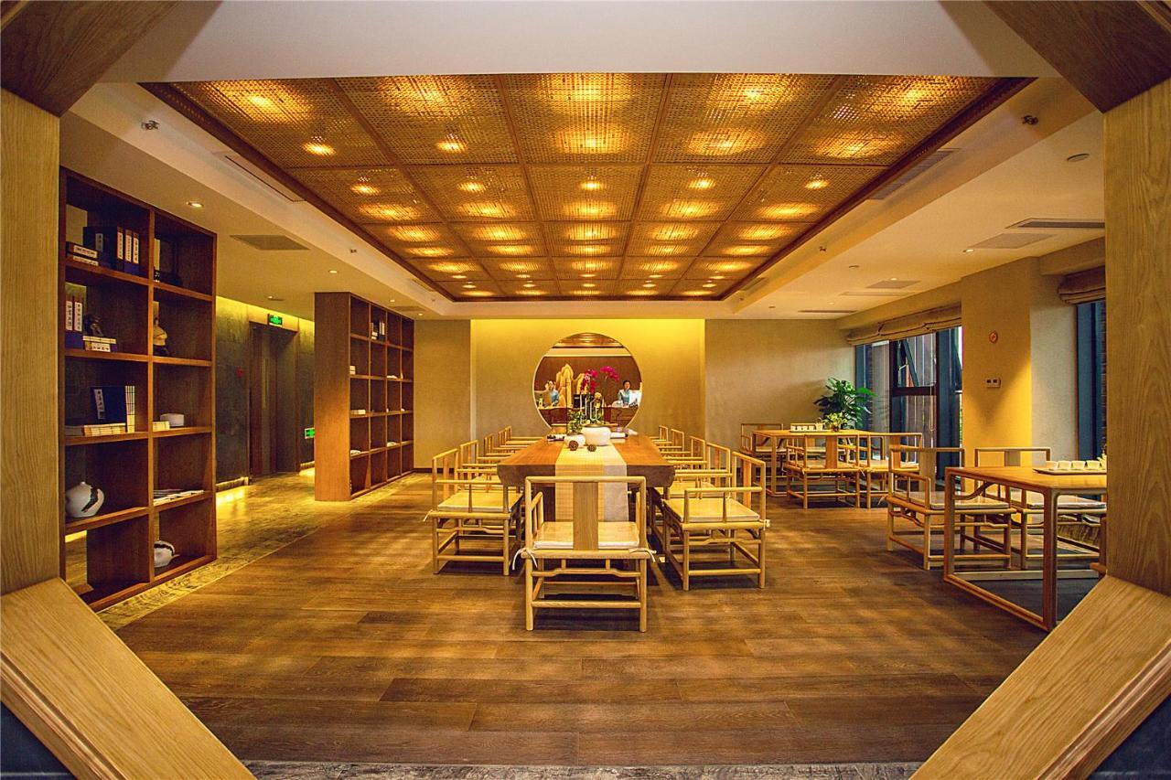 Blossom Tao Hotel（Hangzhou Olympic Center） Номер фото