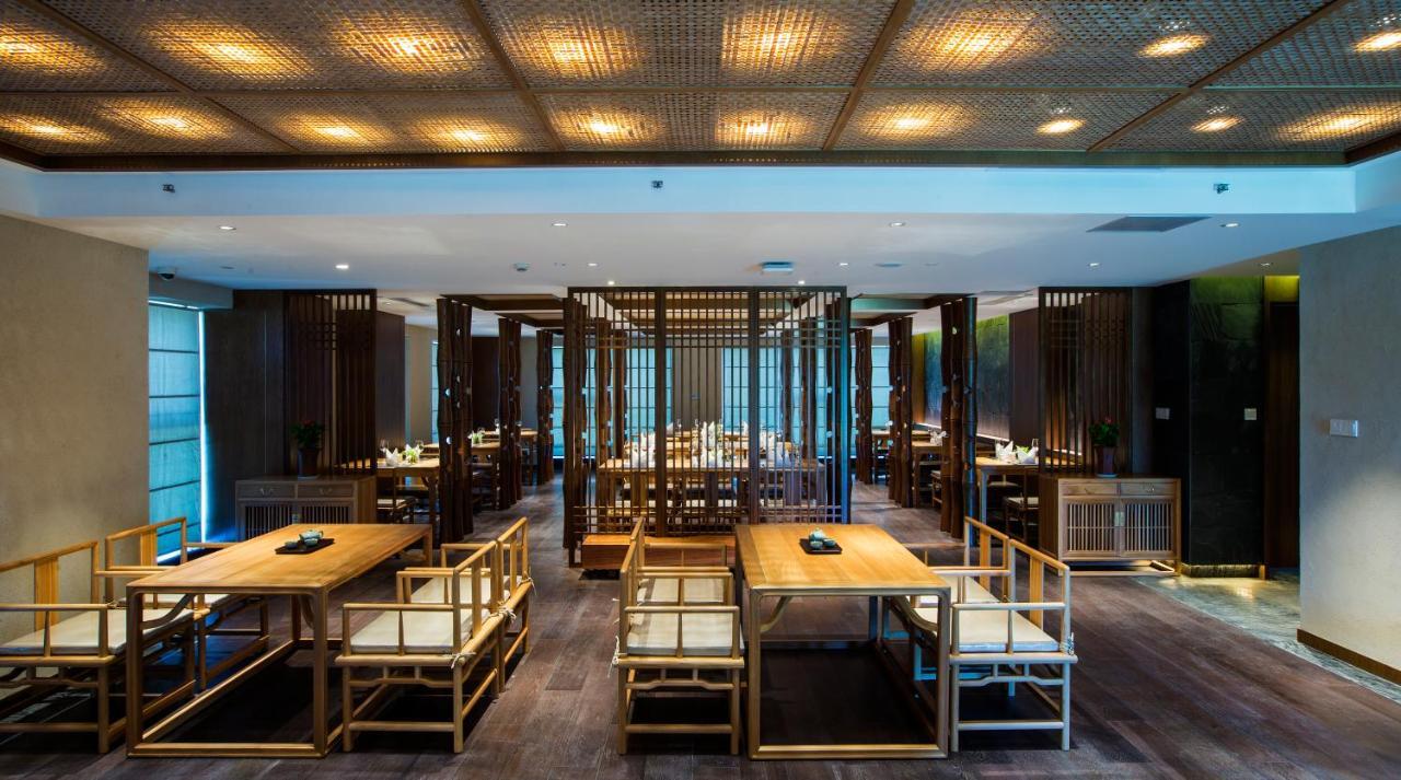 Blossom Tao Hotel（Hangzhou Olympic Center） Номер фото